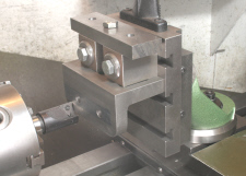 Milling on the lathe using a vertical slide.